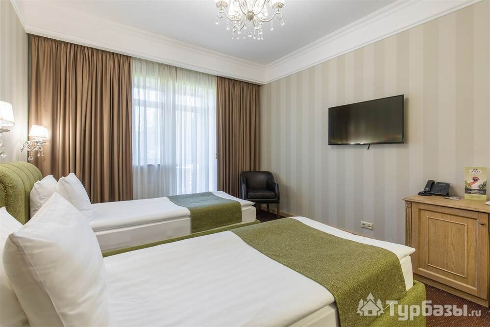 Номер с террасой с двумя отдельными кроватями